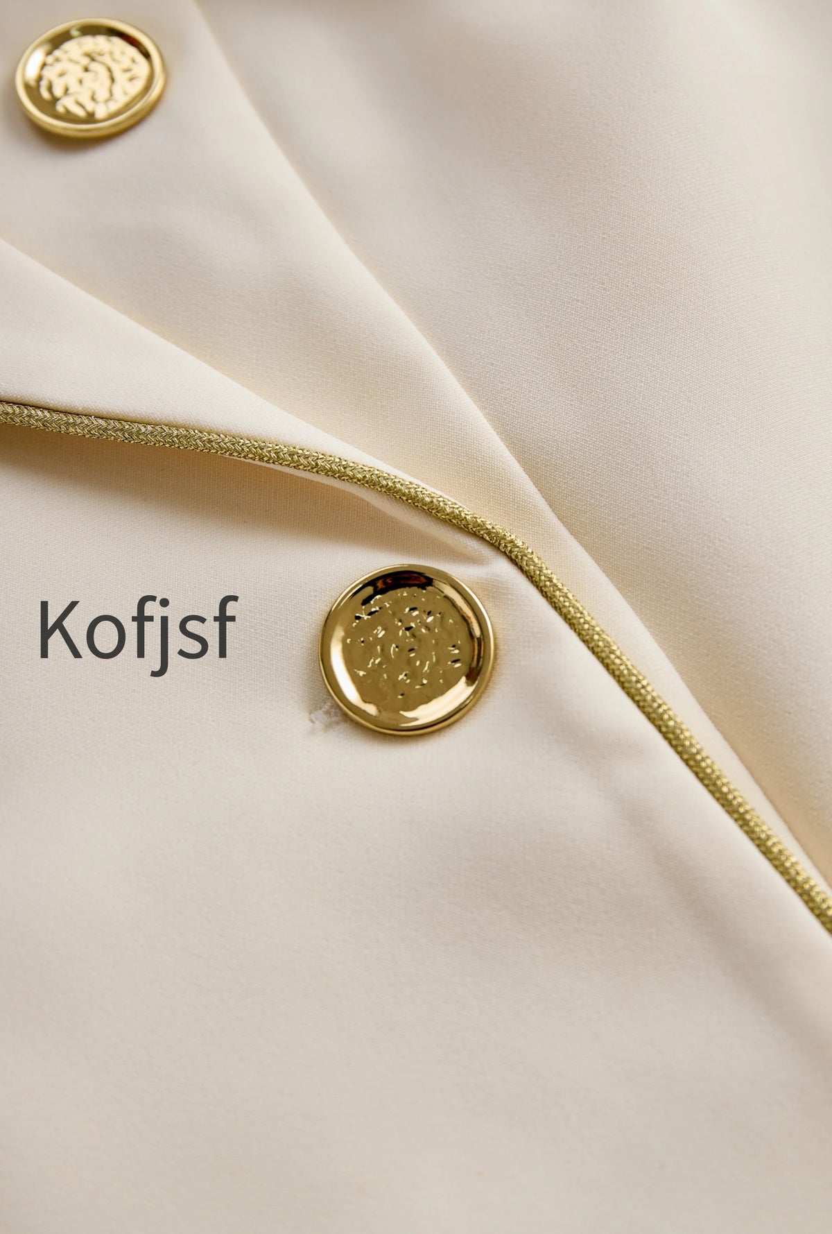 white-sleeveless-blazer-romper-with-gold-trim